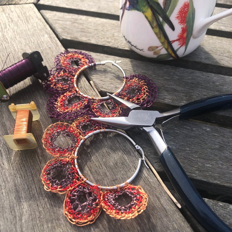 Purple and copper wire hoops