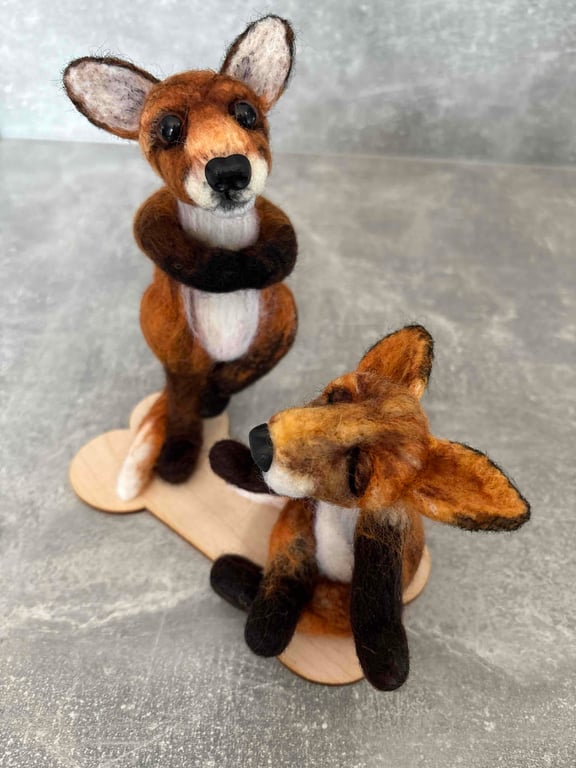 Needle felted yoga foxes 