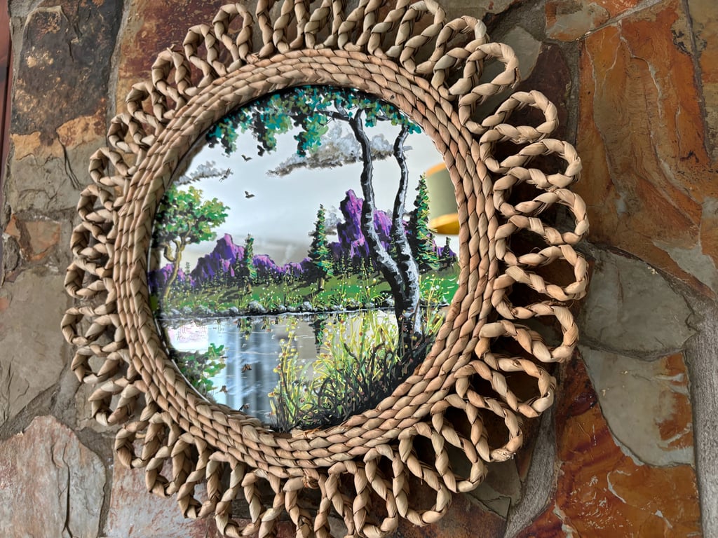 A hand painted and fired mirror by Andrew Jenkins 