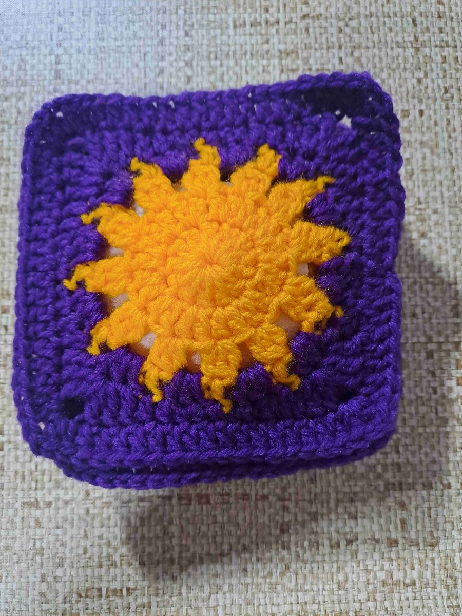 Orange sunshine purple background crochet block