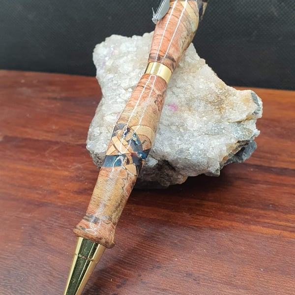 Penispink.  Resin and Wood almalgamation of beauty.