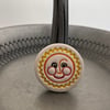 Little ceramic sun magnet