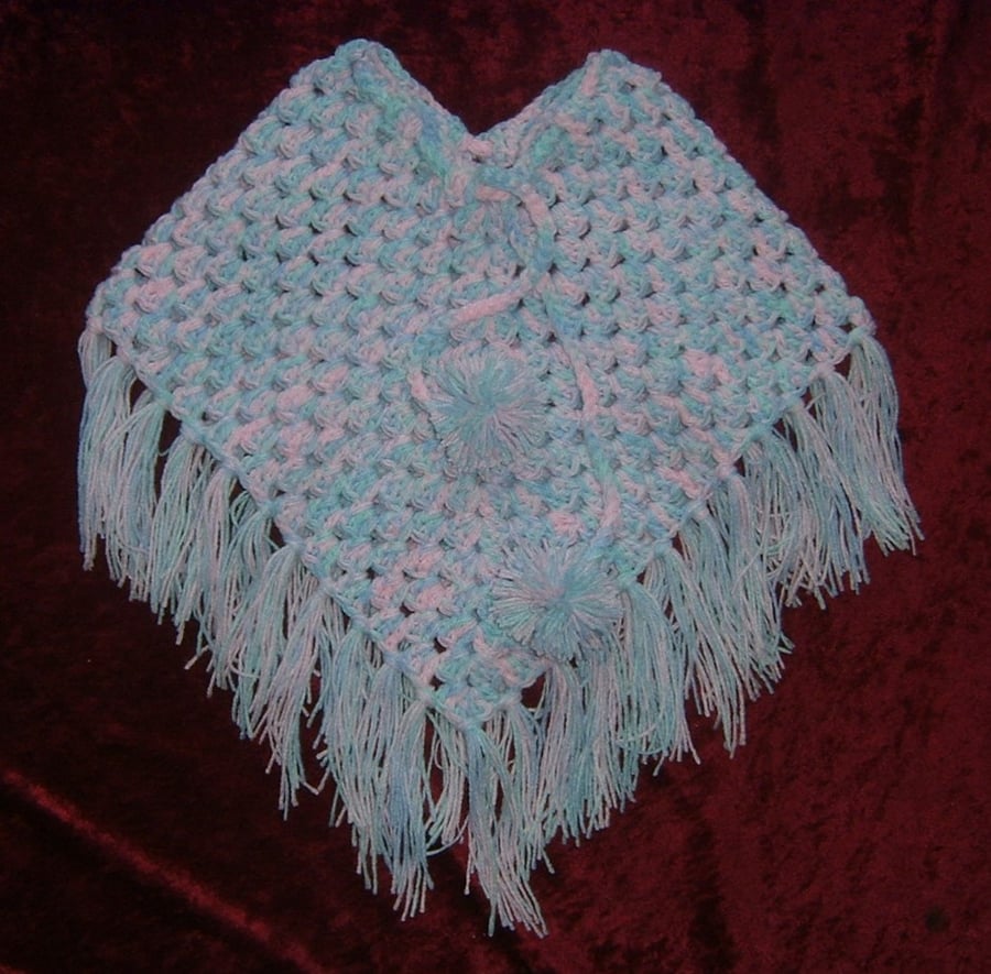Baby's crocheted poncho ref C051