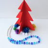 Three shades of blue cube and silver bead necklace