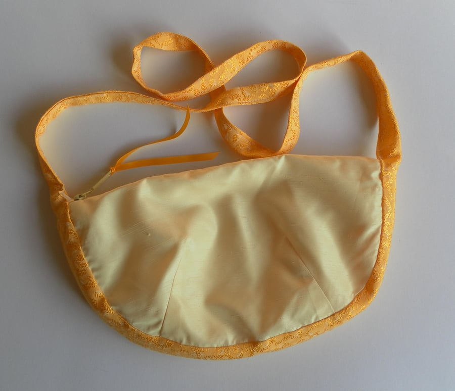  Lemon & gold shoulder bag , inner zipped pocket , zip closure