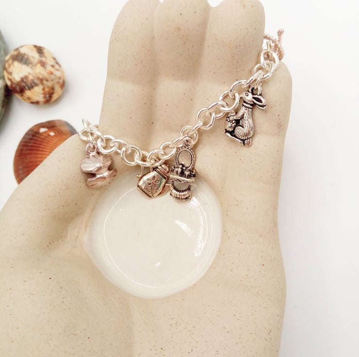 Silver plated charm bracelet on sale
