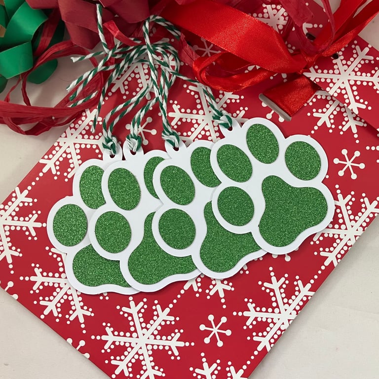 Green glittered paw print gift tags