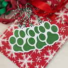 Green glittered paw print gift tags