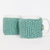 Pair of knitted mug cosies, cup cosy, coffee cosy in Teal. Coffee mug cosy
