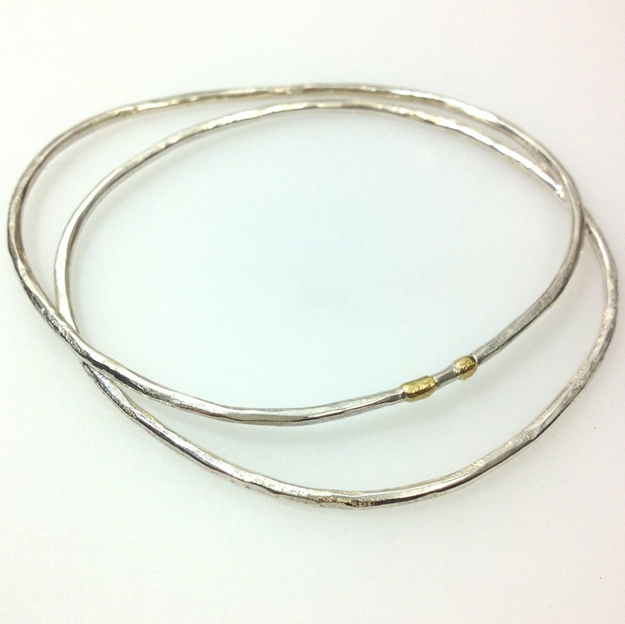 Silver and 18ct gold freeform bangle pair