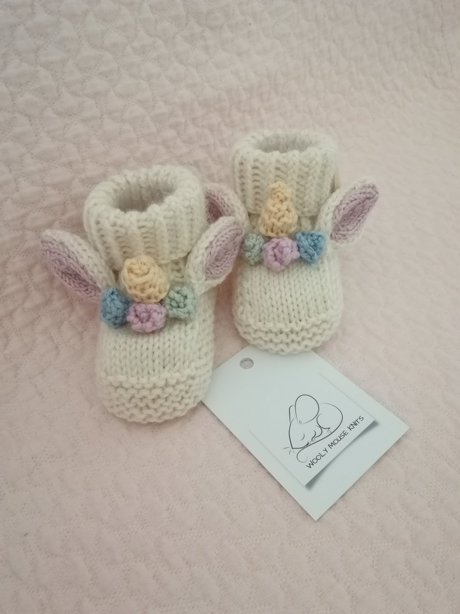 Hand knitted baby bootie , unicorn bootie