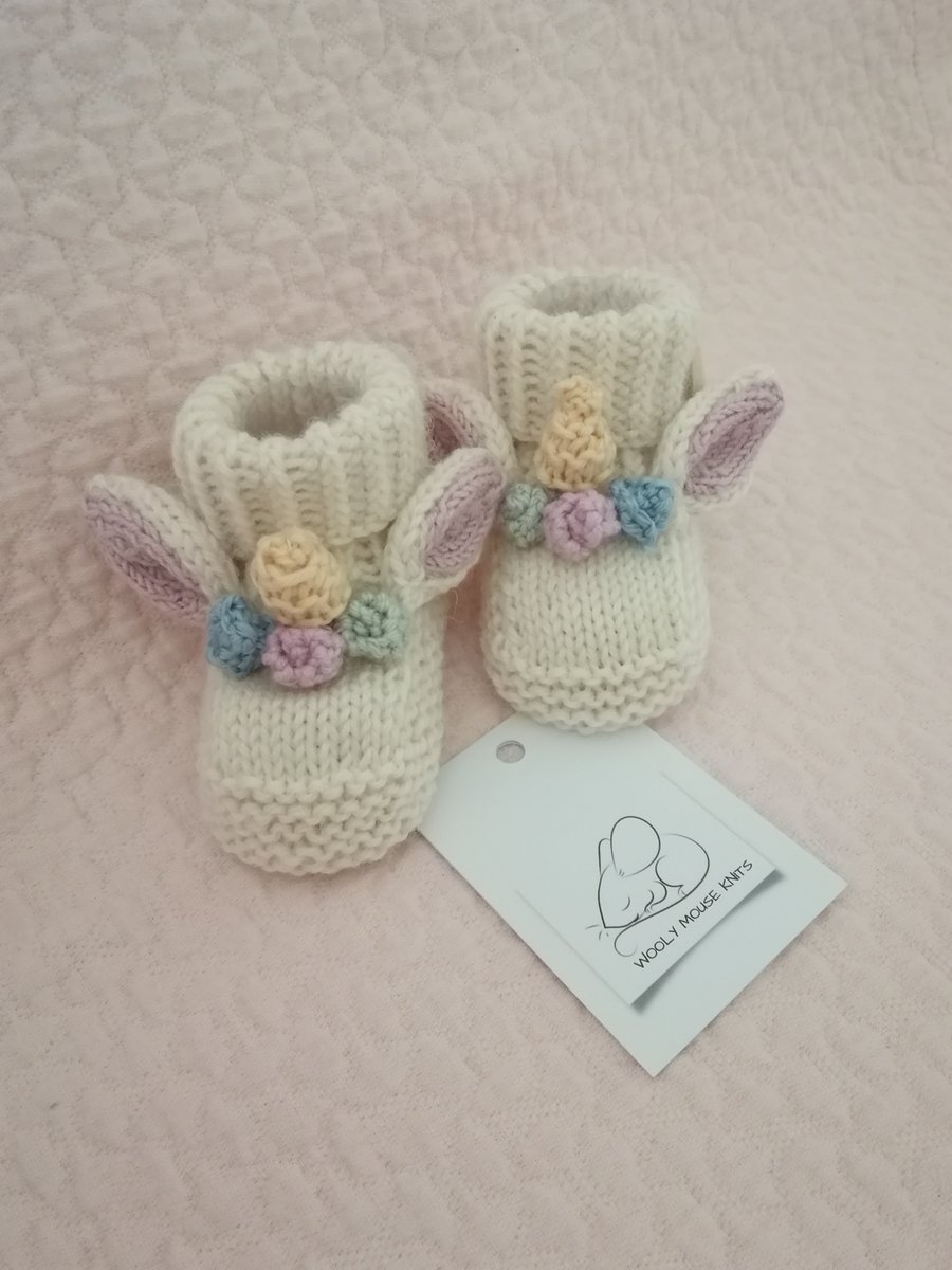 Hand knitted baby bootie , unicorn bootie