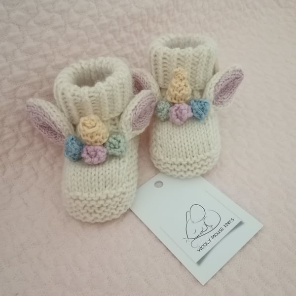 Hand knitted baby bootie , unicorn bootie