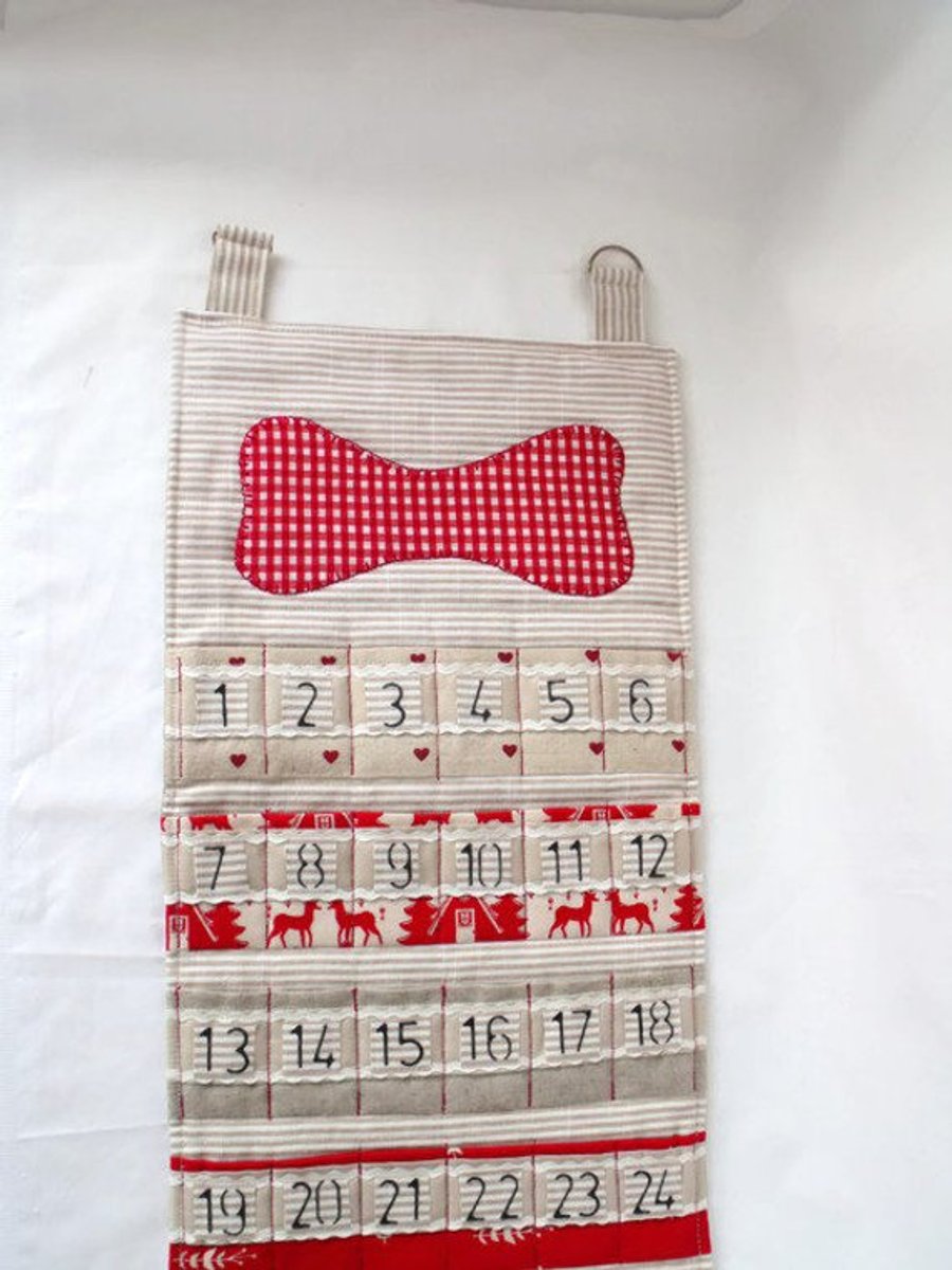 dog hanging christmas advent calendar for storing small gifts or treats in