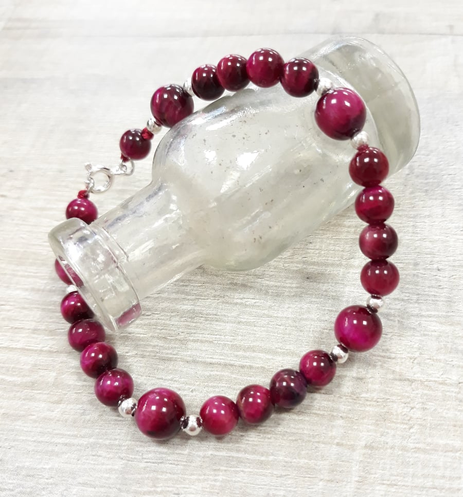 BR380 Pink tigers eye pattern beaded bracelet