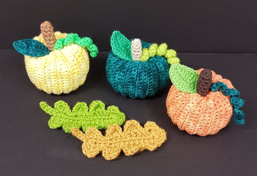 Set of three crochet pumpkins