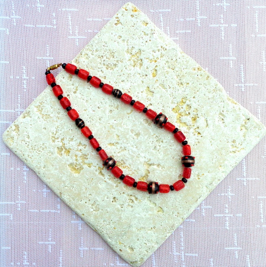 Necklace of glass beads in red, black & gold 