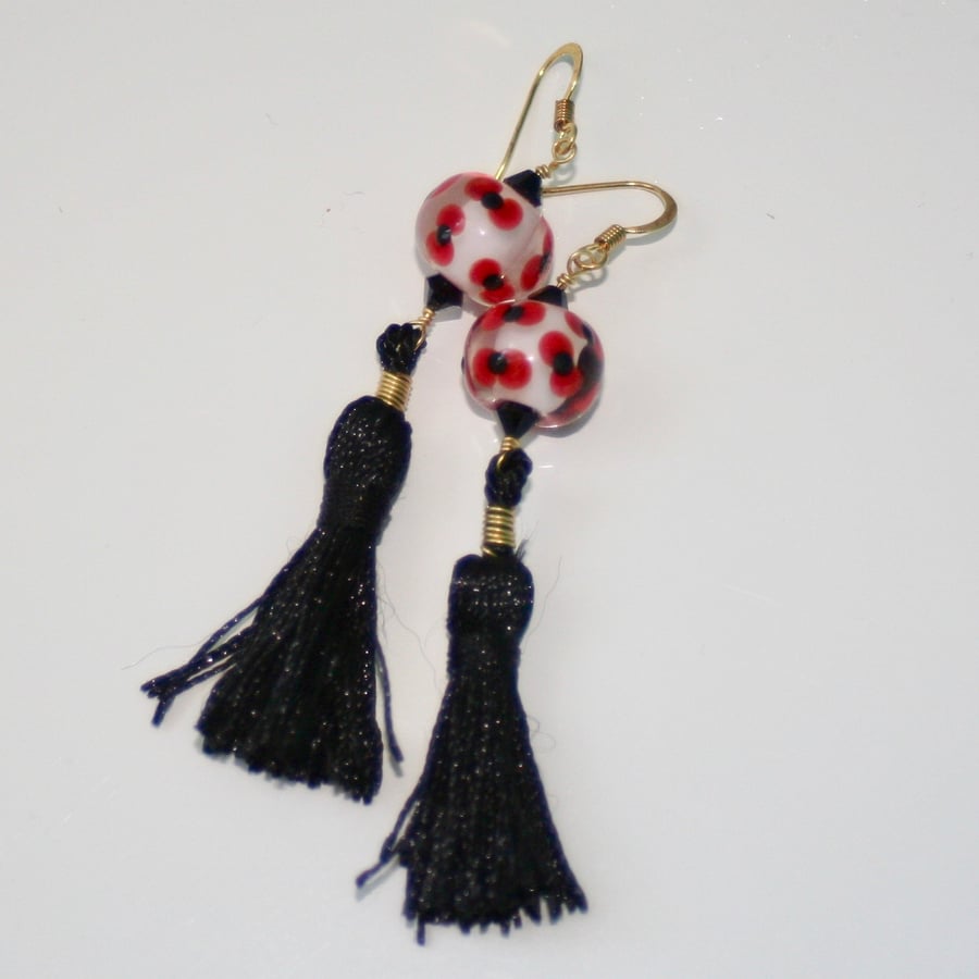 Red and black poppy tassel earrings