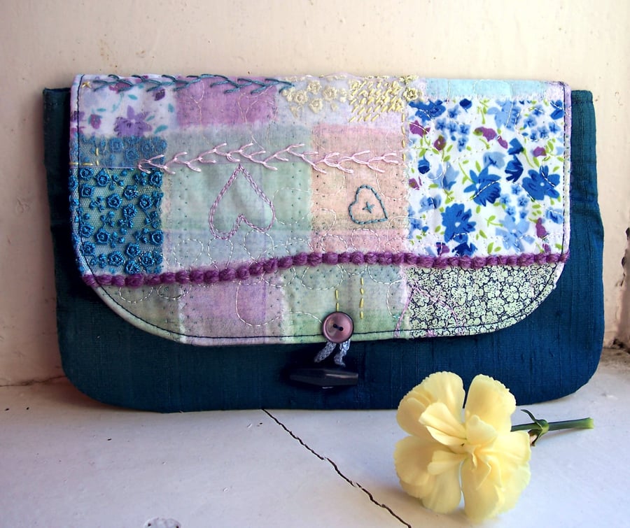 Textile clutch bag in teal silk with hand and machine embroidery - Catmint