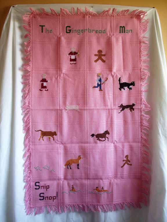 Shawl, cot blanket, 'The Gingerbread Man', hand embroidered, cross stitch