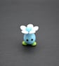 blue glass flower head figure - Image 2