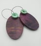 Oval shaped earrings in burgundy with a mint button bead - Image 4