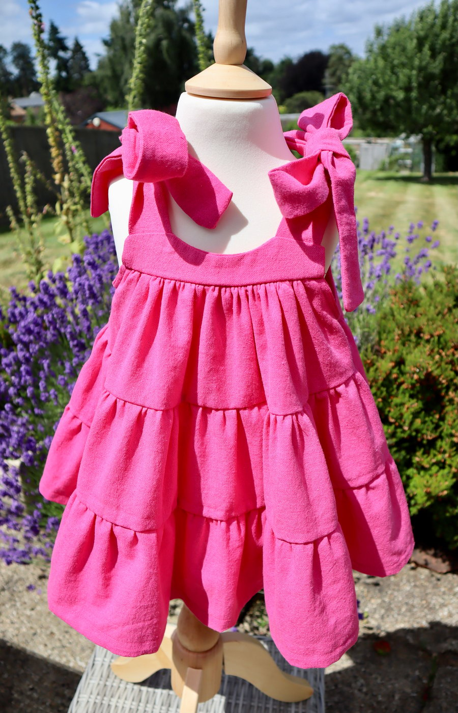 Pink tie strap tiered dress