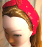 RedChristmas Cotton twist knot elasticated hairband, gold glitter snowflakes