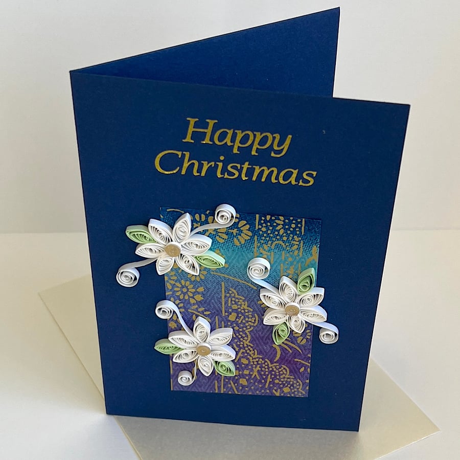 Handmade Christmas card with paper quilling flowers