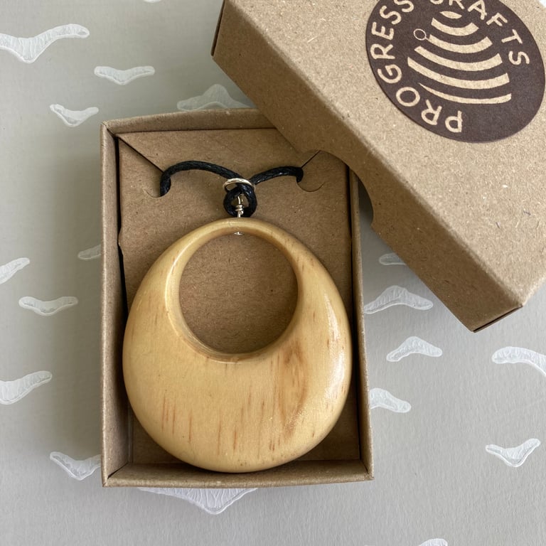 Oval wooden pendant - I was abandoned