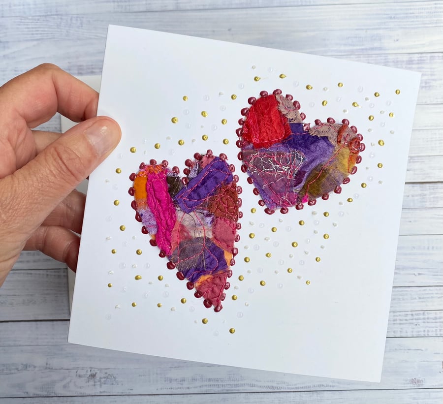 Up-cycled handmade fabric embroidered heart card. 