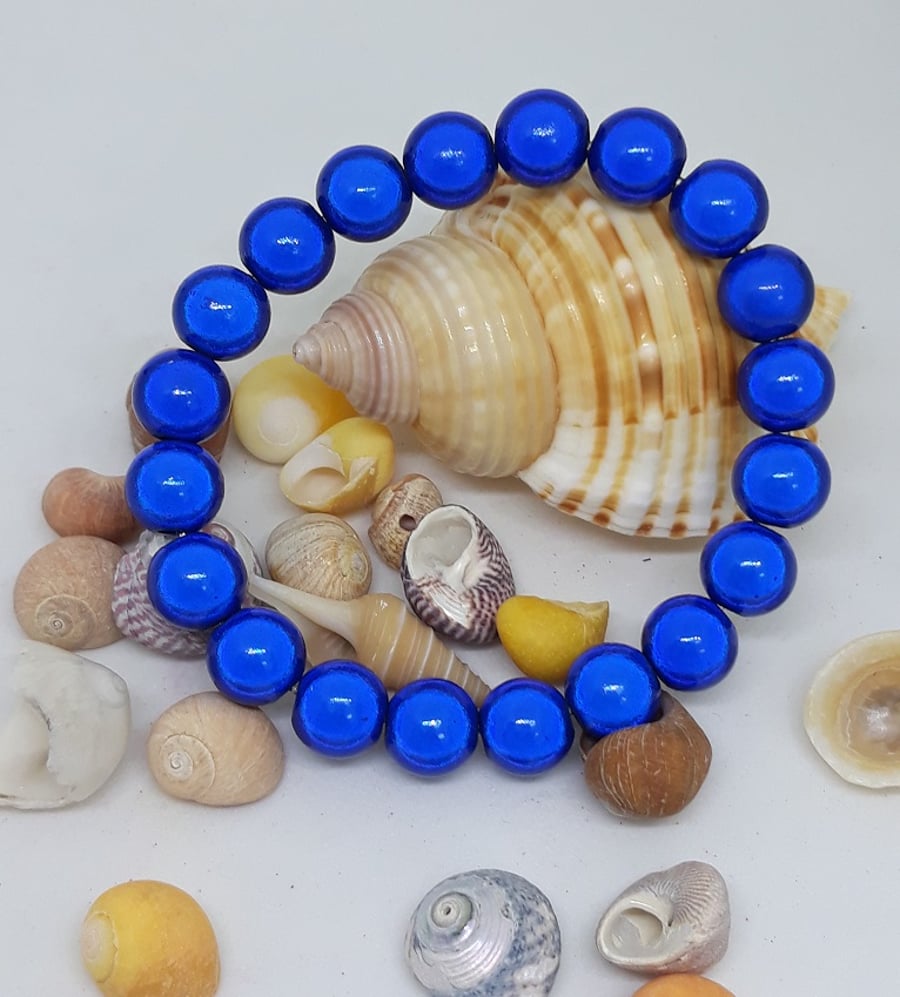 BR309 Blue miracle bead bracelet