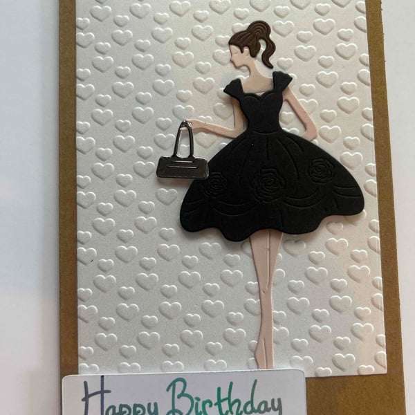 Handcrafted happy birthday girl in a black dress