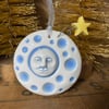 Ceramic man in the Moon Christmas decoration