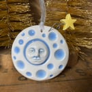 Ceramic man in the Moon Christmas decoration