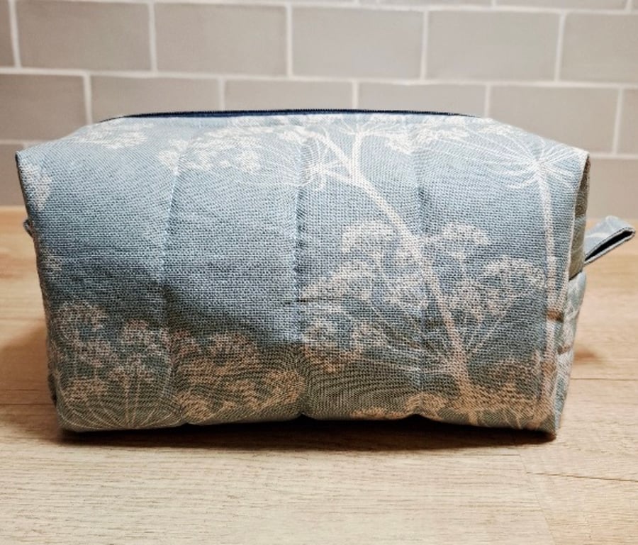 Bluey-green boxed toiletry bag