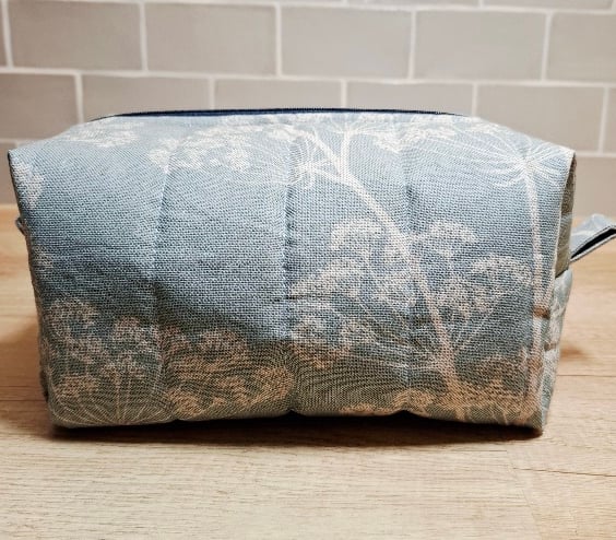 Bluey-green boxed toiletry bag
