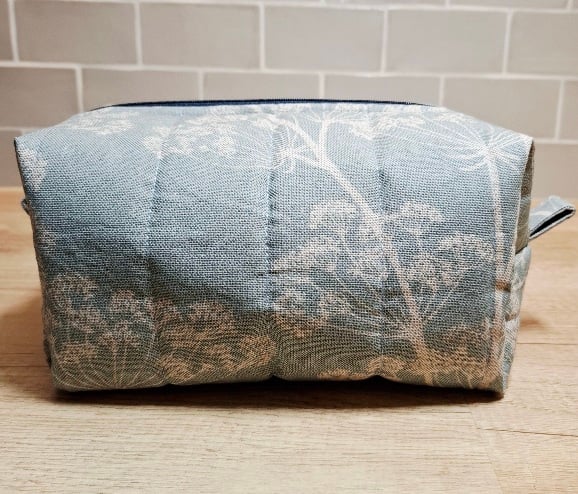 Bluey-green boxed toiletry bag
