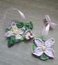A pair of rustic 'pink clematis" clay hanging sculptures.  