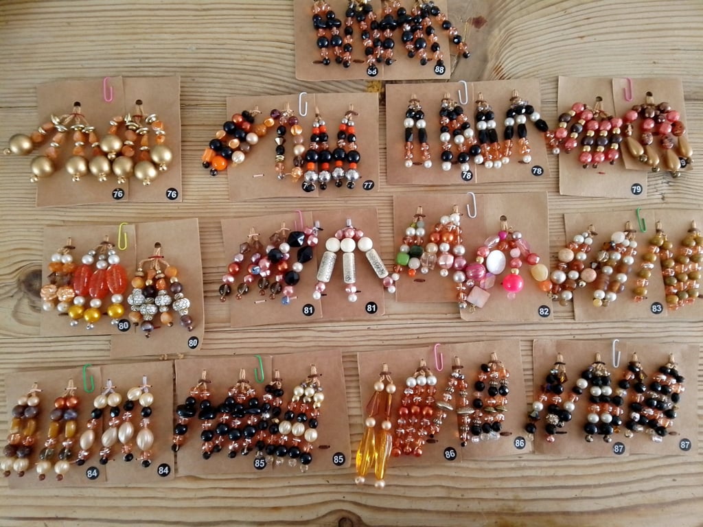 Sets of colour coordinated beaded gift decorations.