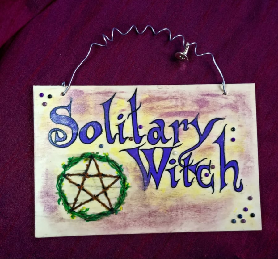 Solitary Witch Hanging sign