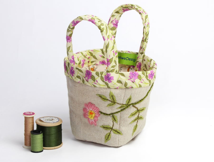 Tiny oatmeal linen bag with hand stitched dog rose embroidery