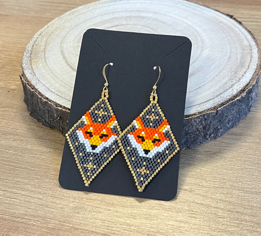 Beadwork fox earrings in orange and gold tones