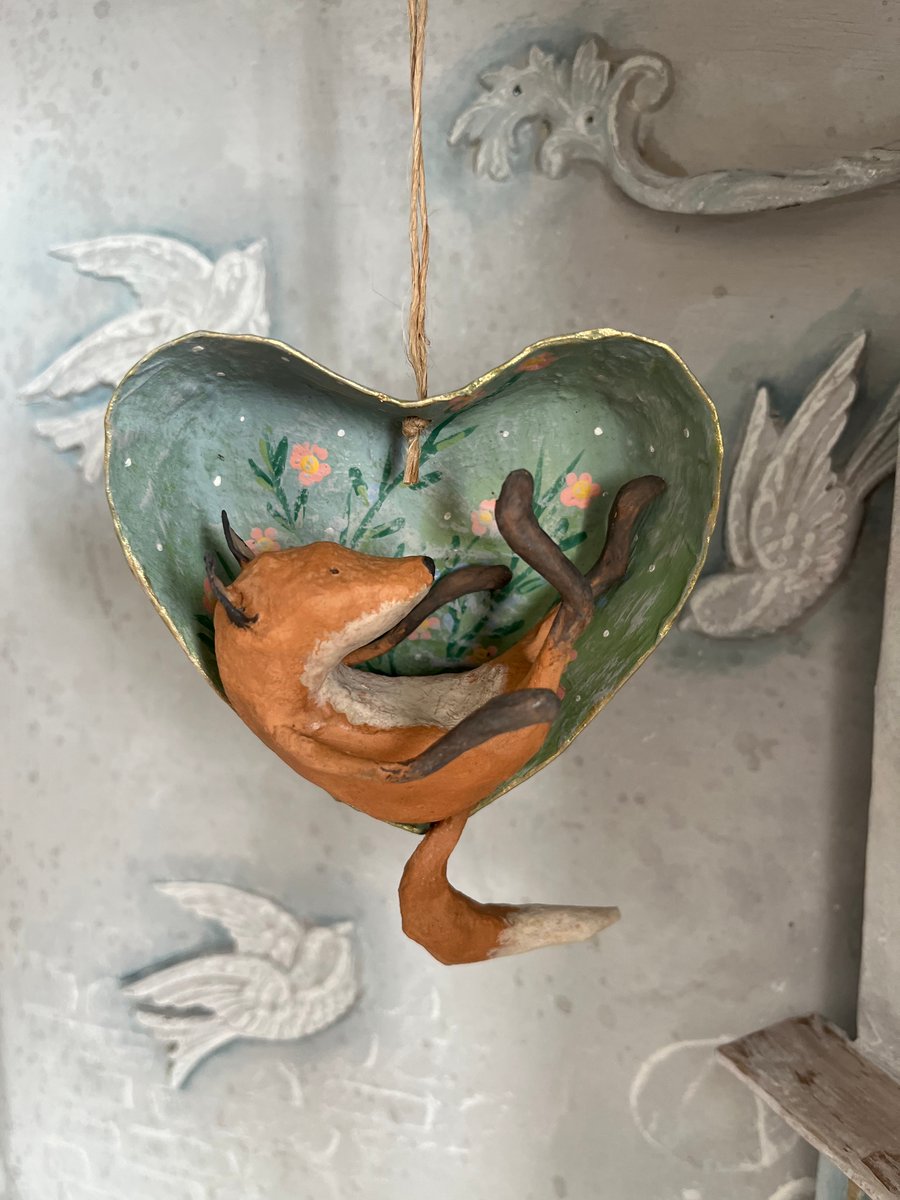 Paper mache fox in a hanging heart