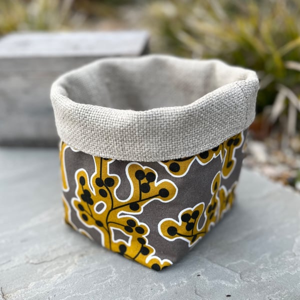 Mustard and grey cotton and linen reversible storage basket plant pot