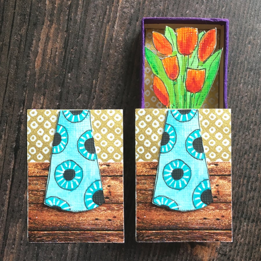 Matchbox art. Tulips in blue vase.
