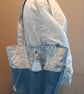 Blue tote bag with pockets and magnetic popper fastening.   - Image 4