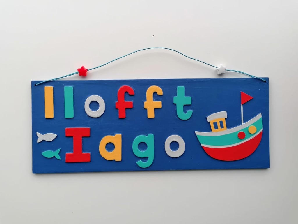 Welsh "Llofft" Boat themed personalised name plate with Navy blue background.