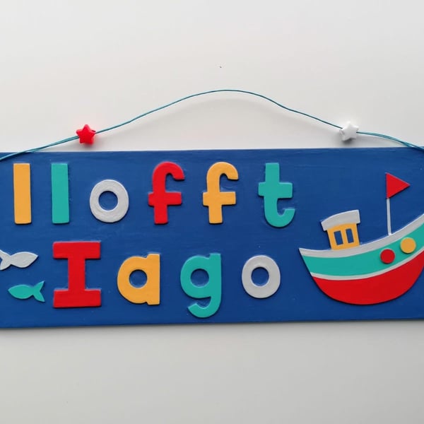 Welsh "Llofft" Boat themed personalised name plate with Navy blue background.