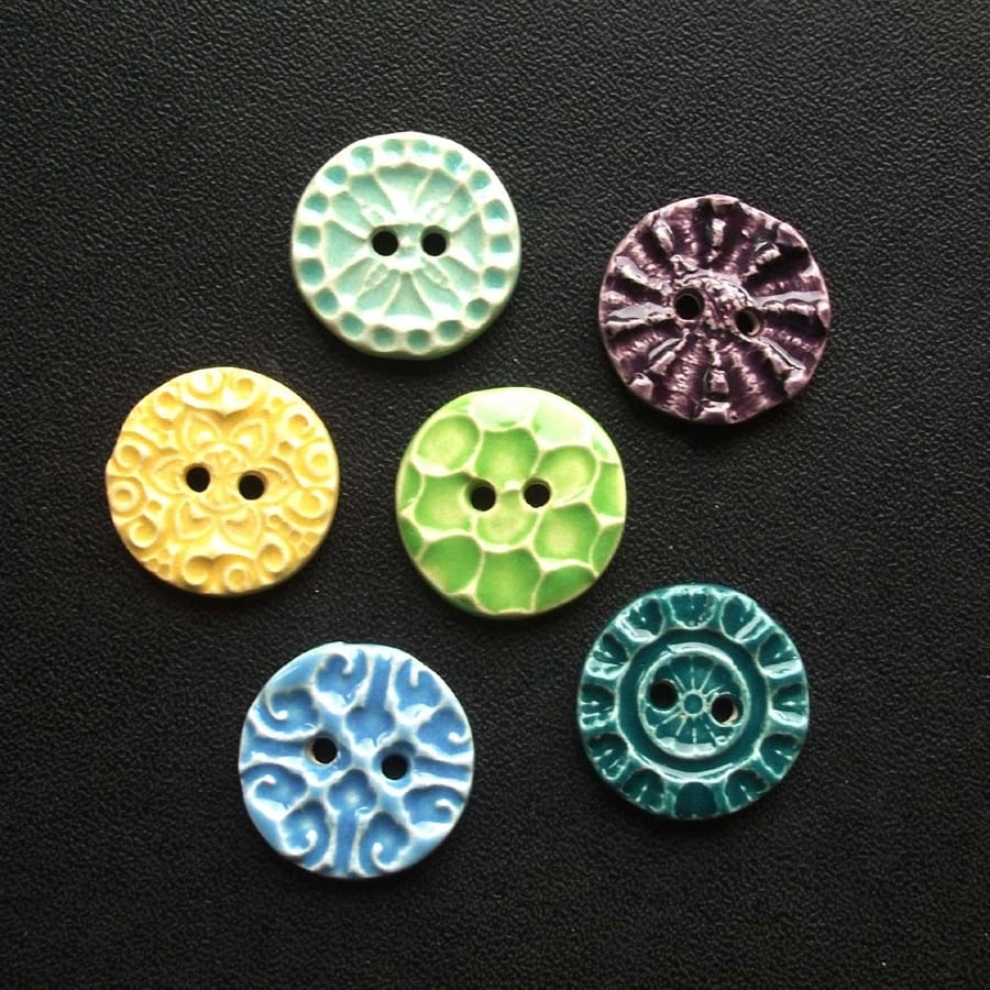 Set of six little handmade ceramic buttons